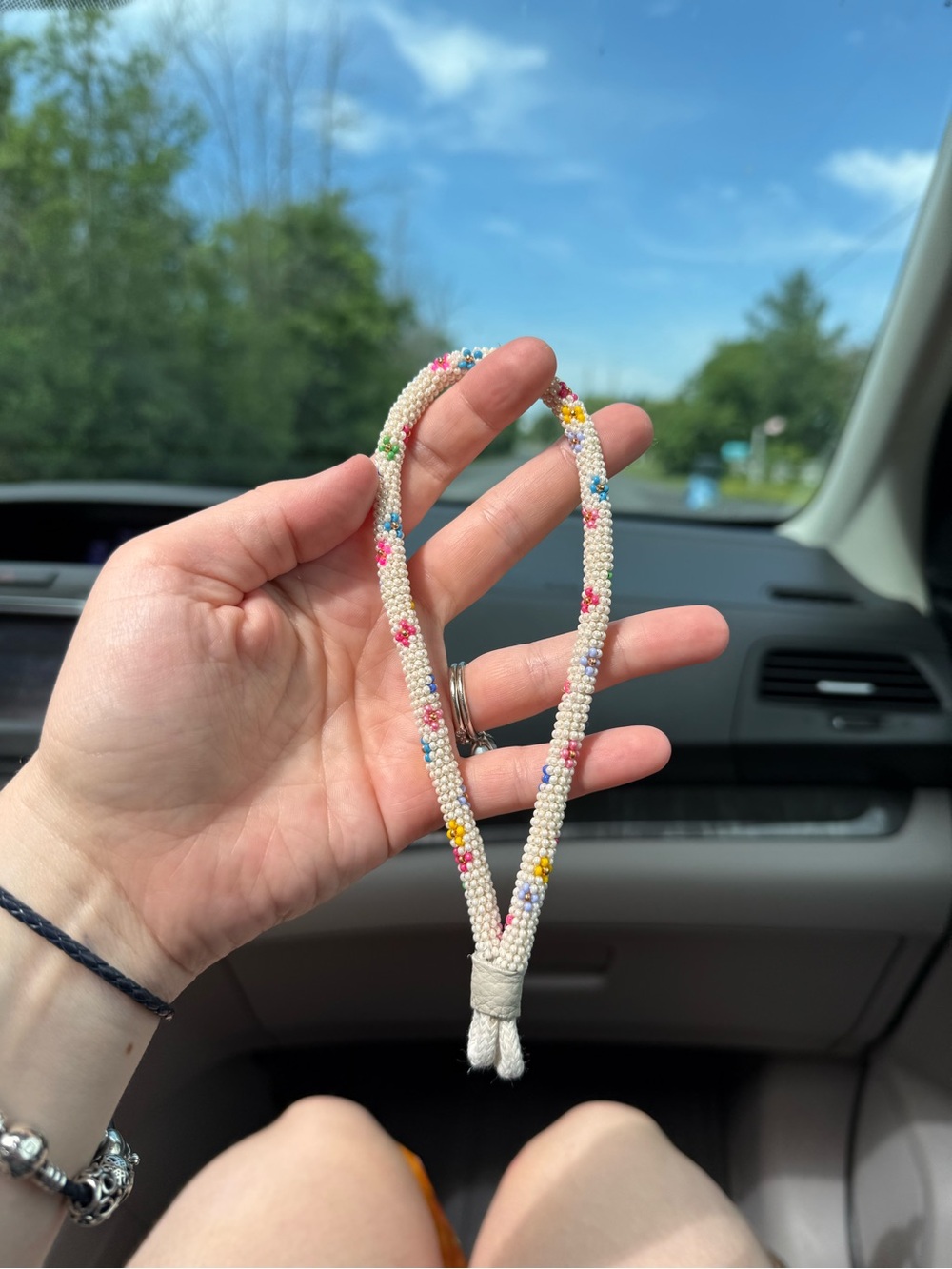 Indigenous beaded keychain: multicolour flowers hand made.